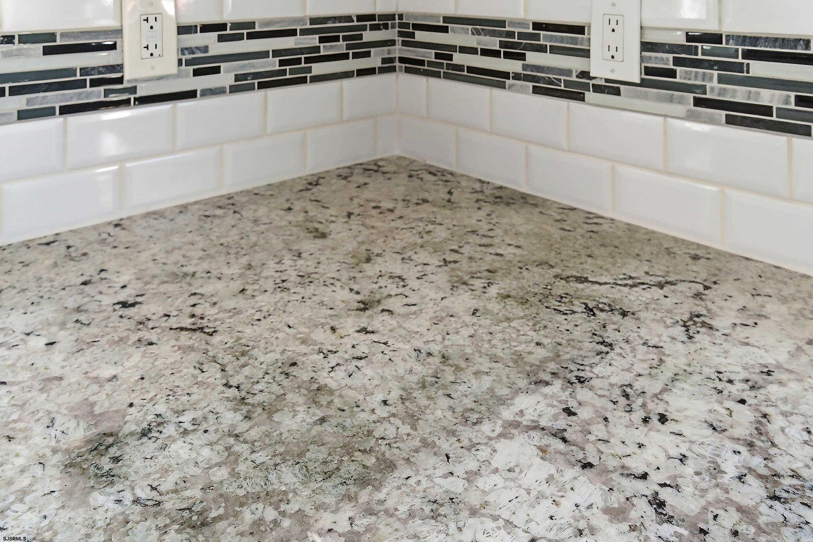 183 Jordan Road Somers Point, NJ 08244 - Photo 16 of 42 a close view of a stove top oven and cabinets