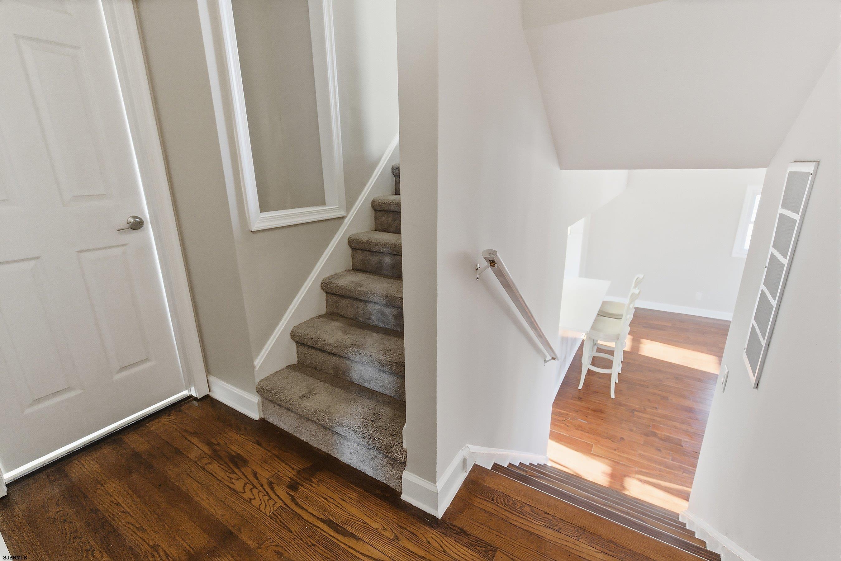 183 Jordan Road Somers Point, NJ 08244 - Photo 19 of 42 a view of entryway with wooden floor and stairs