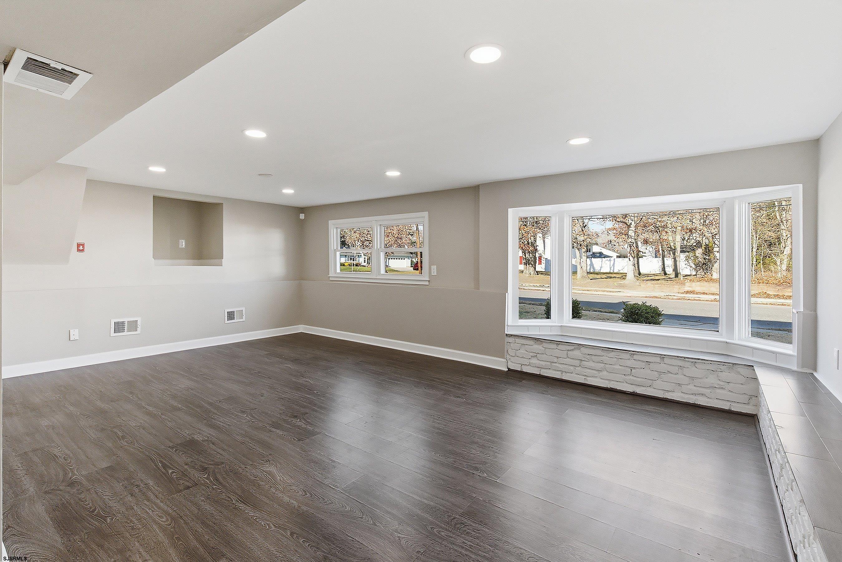 183 Jordan Road Somers Point, NJ 08244 - Photo 35 of 42 wooden floor in an empty room with a window
