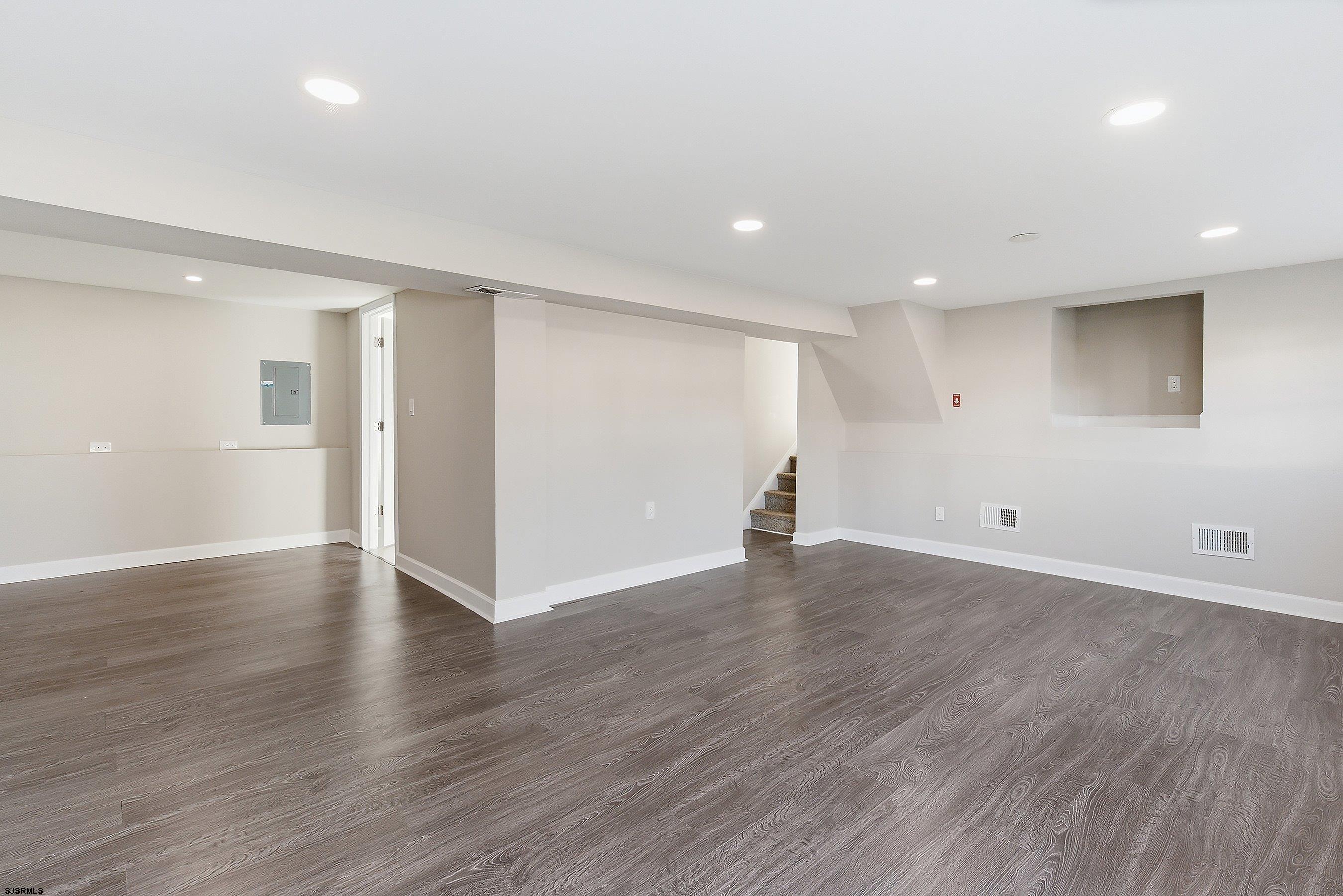 183 Jordan Road Somers Point, NJ 08244 - Photo 36 of 42 a view of an empty room with wooden floor