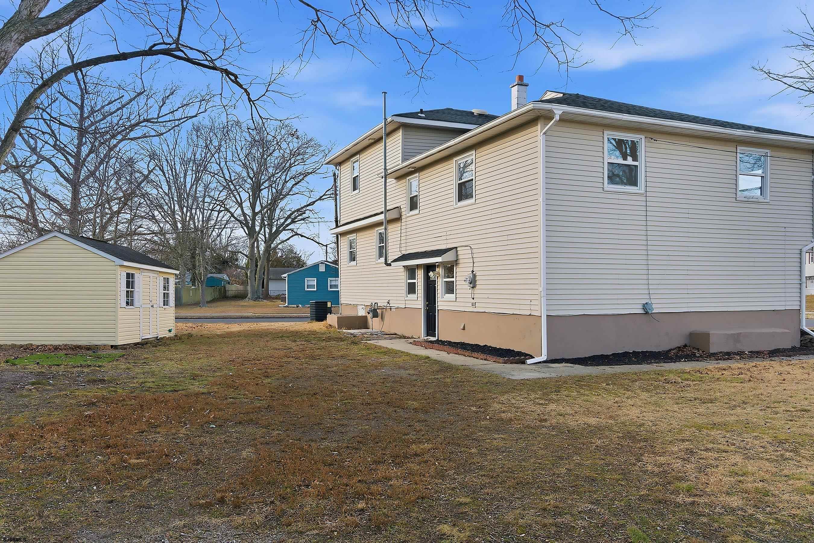 183 Jordan Road Somers Point, NJ 08244 - Photo 41 of 42 a front view of a house with a yard