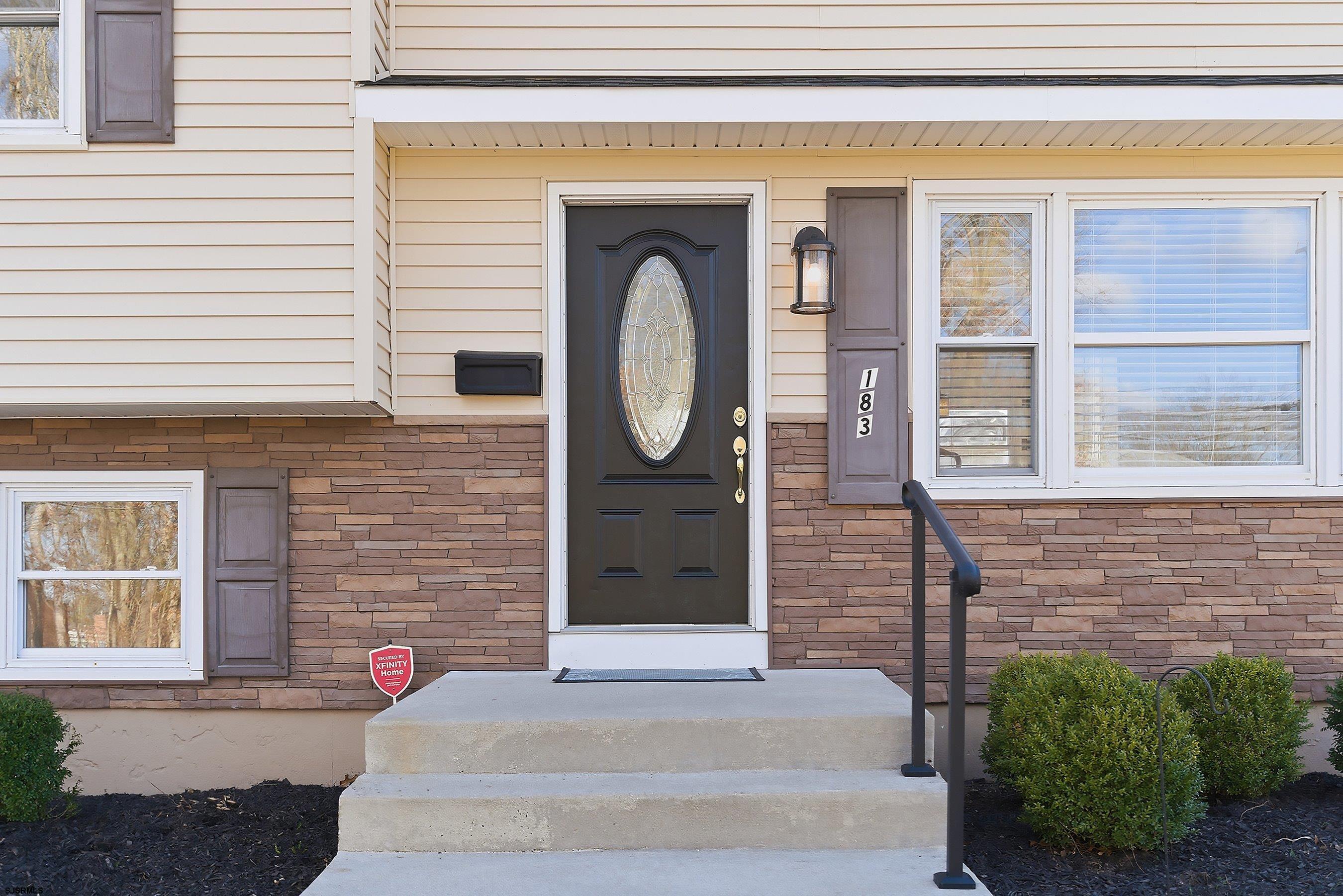 183 Jordan Road Somers Point, NJ 08244 - Photo 7 of 42 a front view of a house with a garden