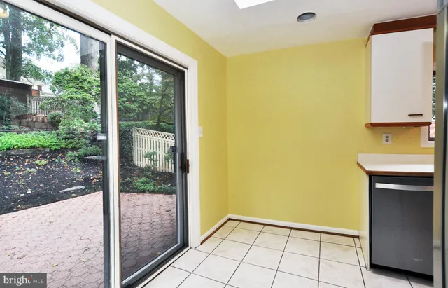 a view of a room that has a large window