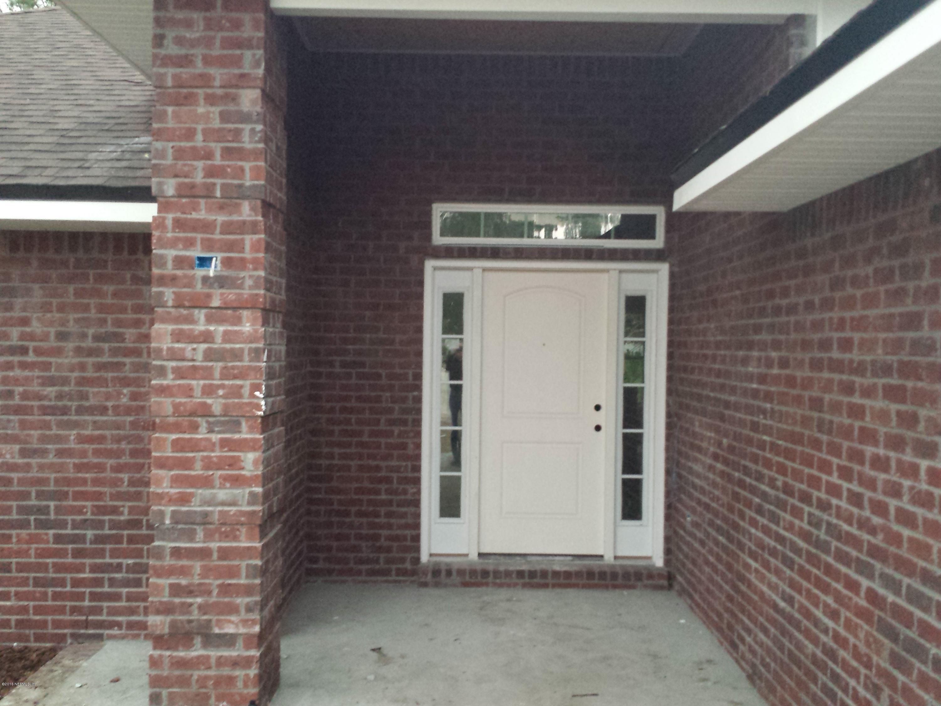 88165 Maybourne Road Yulee, FL 32097 - Photo 2 of 7 a view of a door