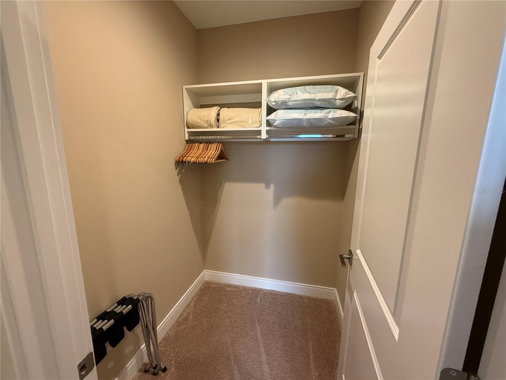 3065 Rockefeller Way Kissimmee, FL 34747 - Photo 35 of 59 a view of storage and utility room with a sink