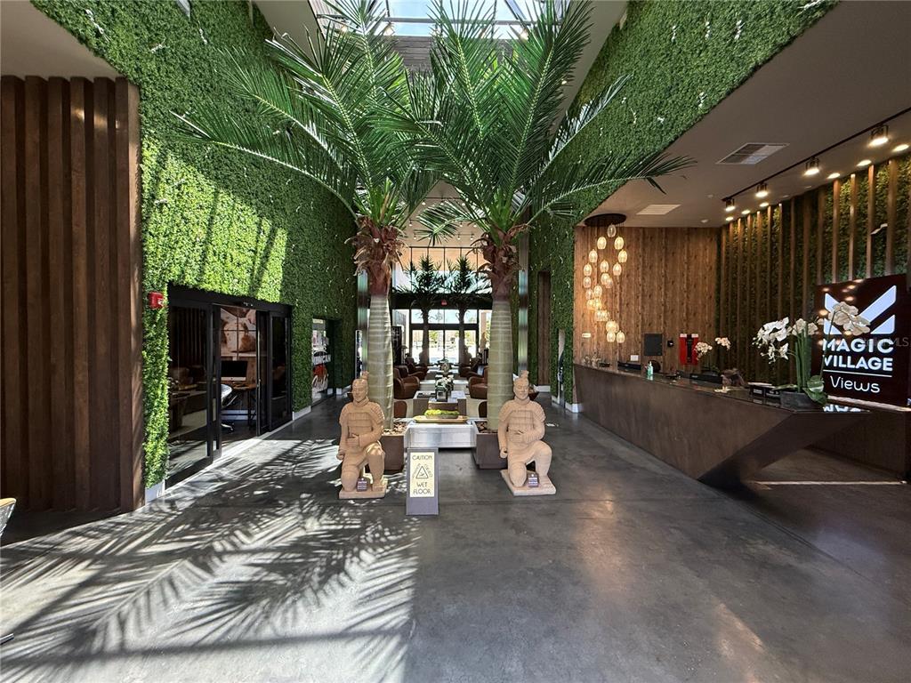 3065 Rockefeller Way Kissimmee, FL 34747 - Photo 40 of 59 a building outdoor space with patio furniture and potted plants