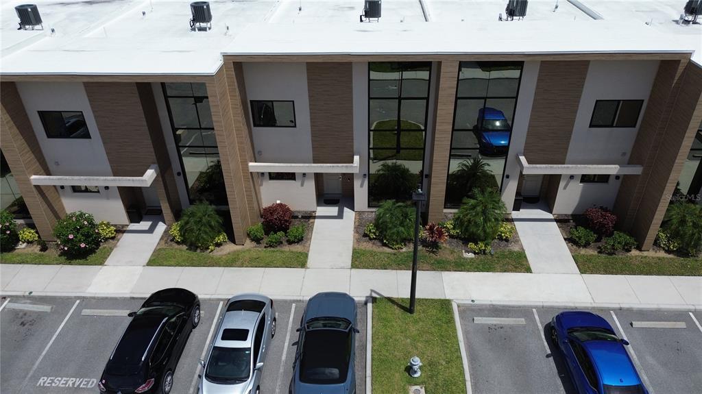 3065 Rockefeller Way Kissimmee, FL 34747 - Photo 59 of 59 a front view of a house with outdoor seating and plants