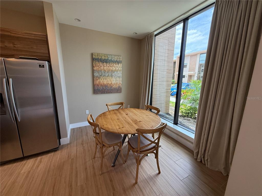 3065 Rockefeller Way Kissimmee, FL 34747 - Photo 10 of 59 a view of a livingroom with furniture window and wooden floor