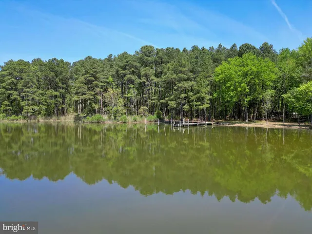 a view of a lake with a yard
