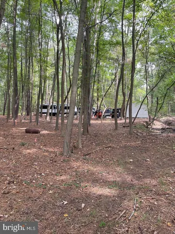 a view of a balcony with an outdoor space and seating area