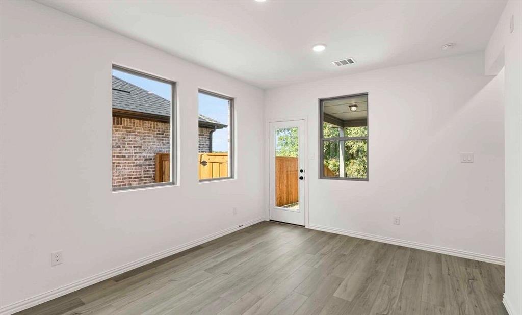 14204 Gallatin Street Pilot Point, TX 76258 - Photo 10 of 14 an empty room with a window