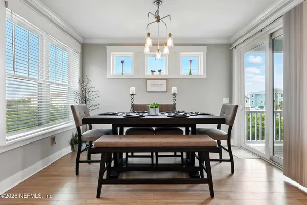 a view of entryway with stairs and wooden floor