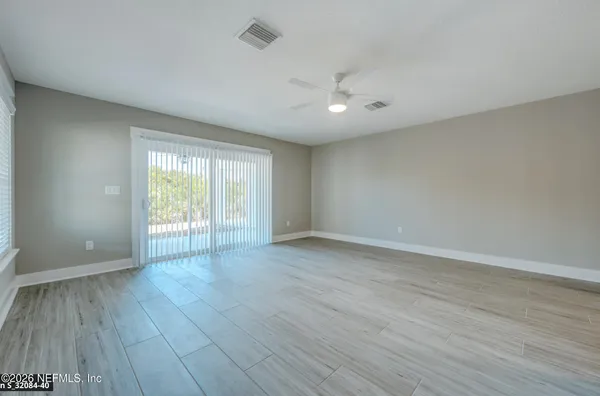 a view of a fountain in front of a house