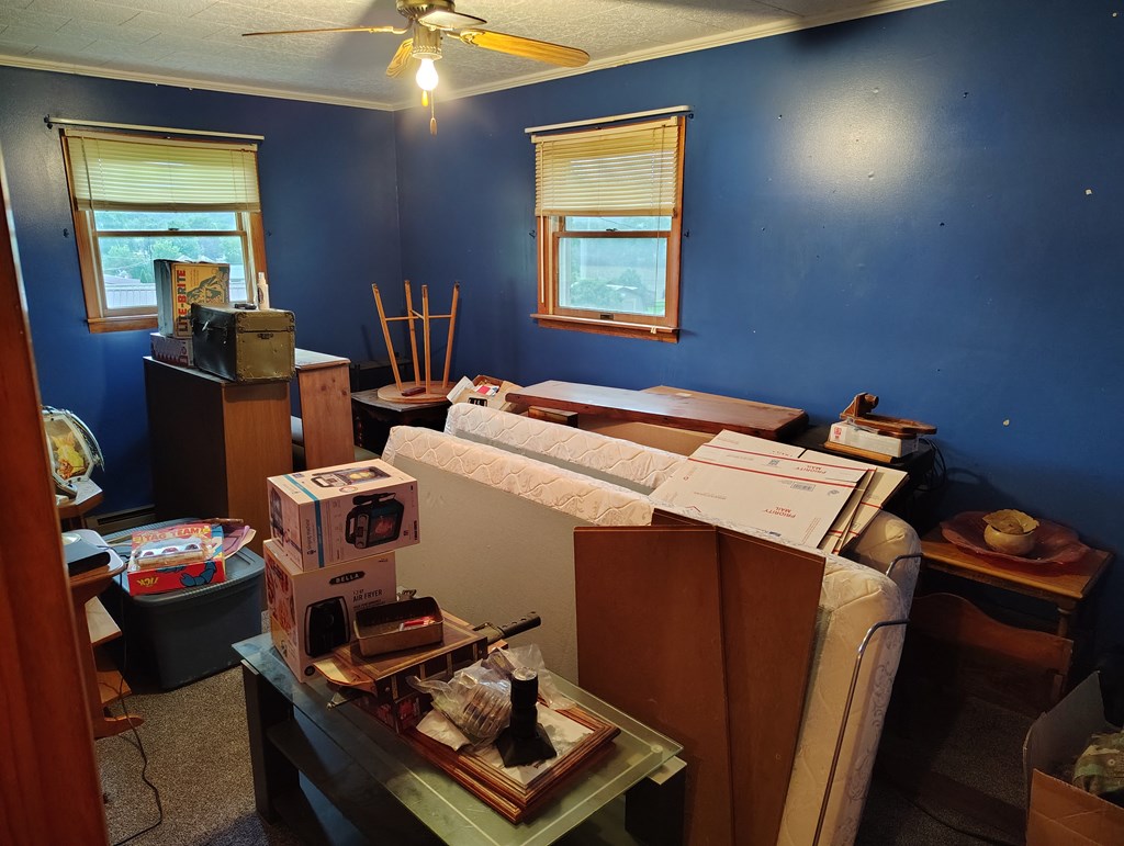 134 Railroad Street Oak Ridge, PA 16245 - Photo 13 of 20 a room with furniture and window