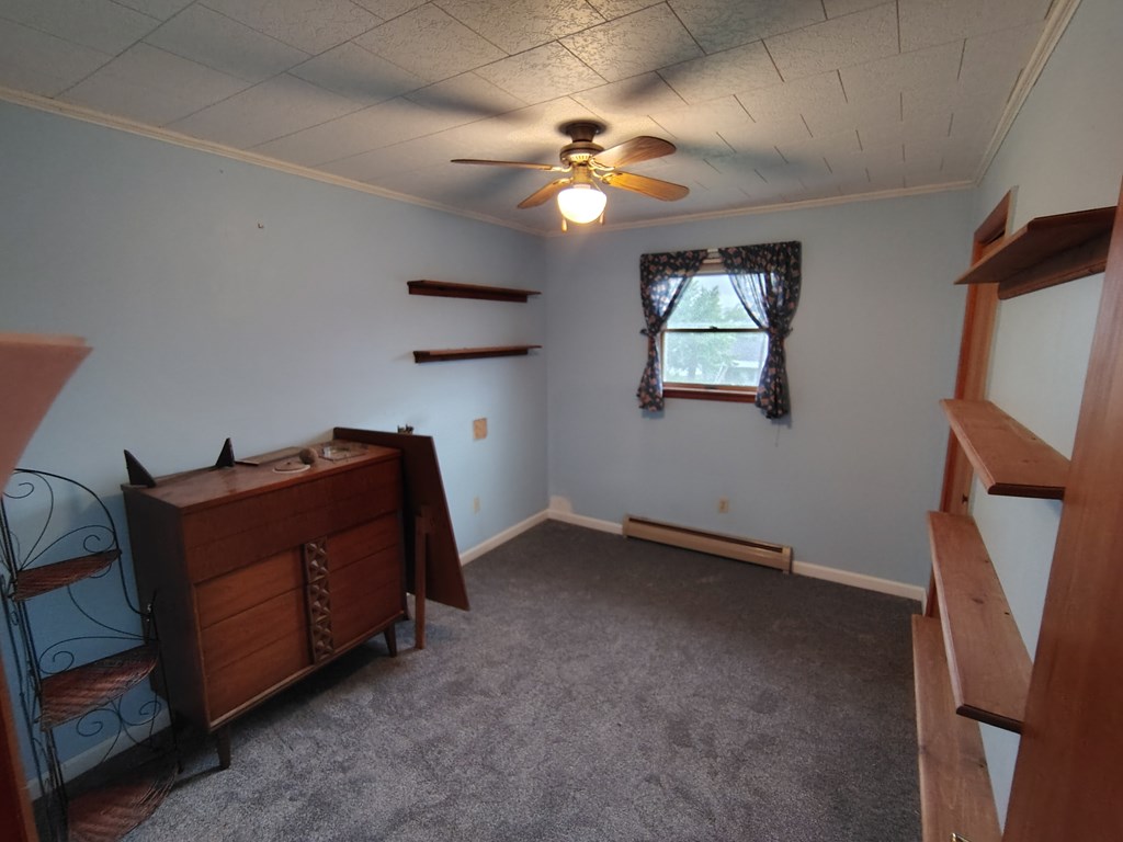 134 Railroad Street Oak Ridge, PA 16245 - Photo 14 of 20 a living room with furniture and a window