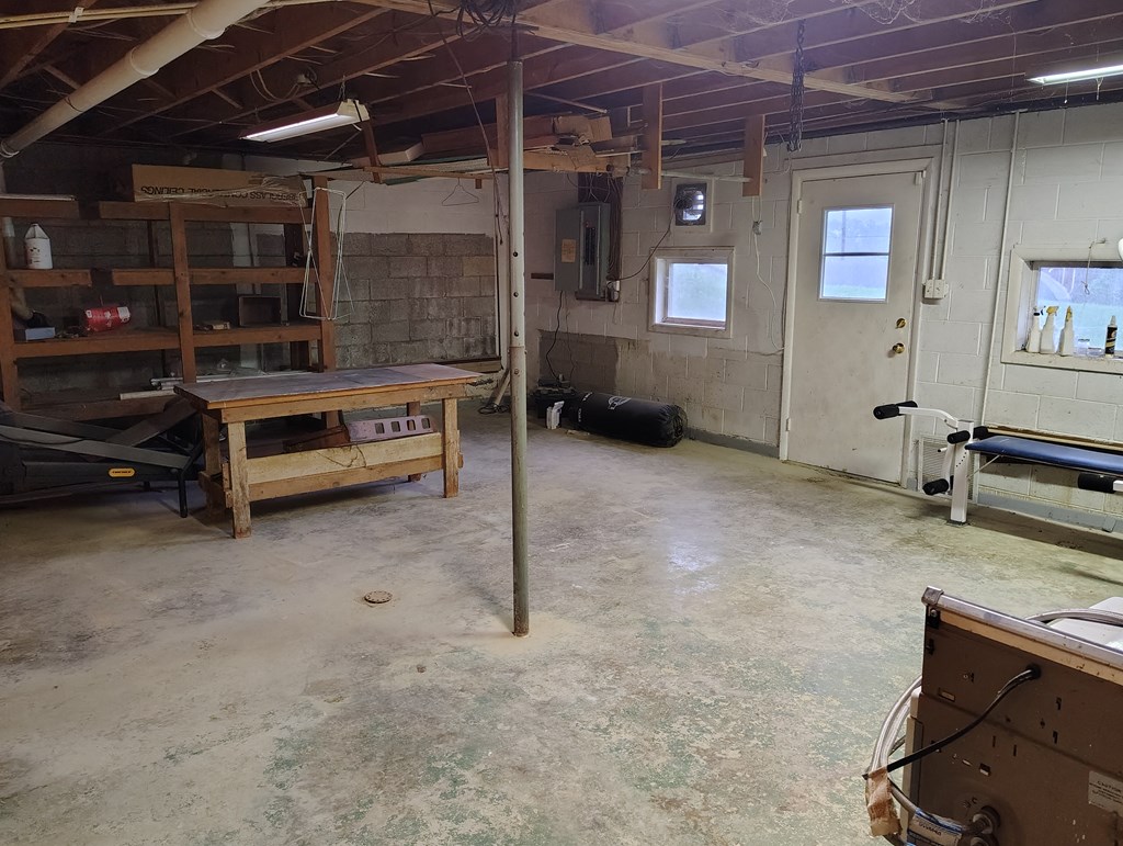 134 Railroad Street Oak Ridge, PA 16245 - Photo 18 of 20 a view of a room with gym equipment