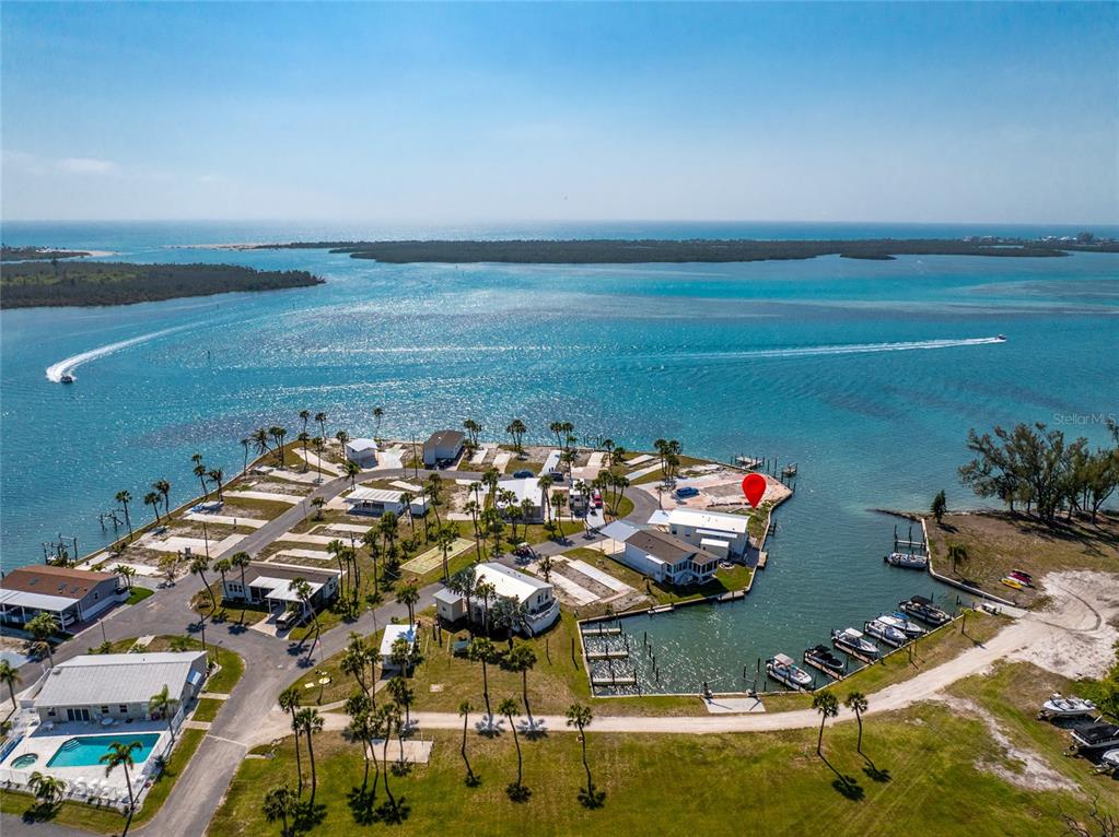 7500 Park Pointe Drive, Unit 42 Englewood, FL 34224 - Photo 12 of 33 an aerial view of a houses with an outdoor space