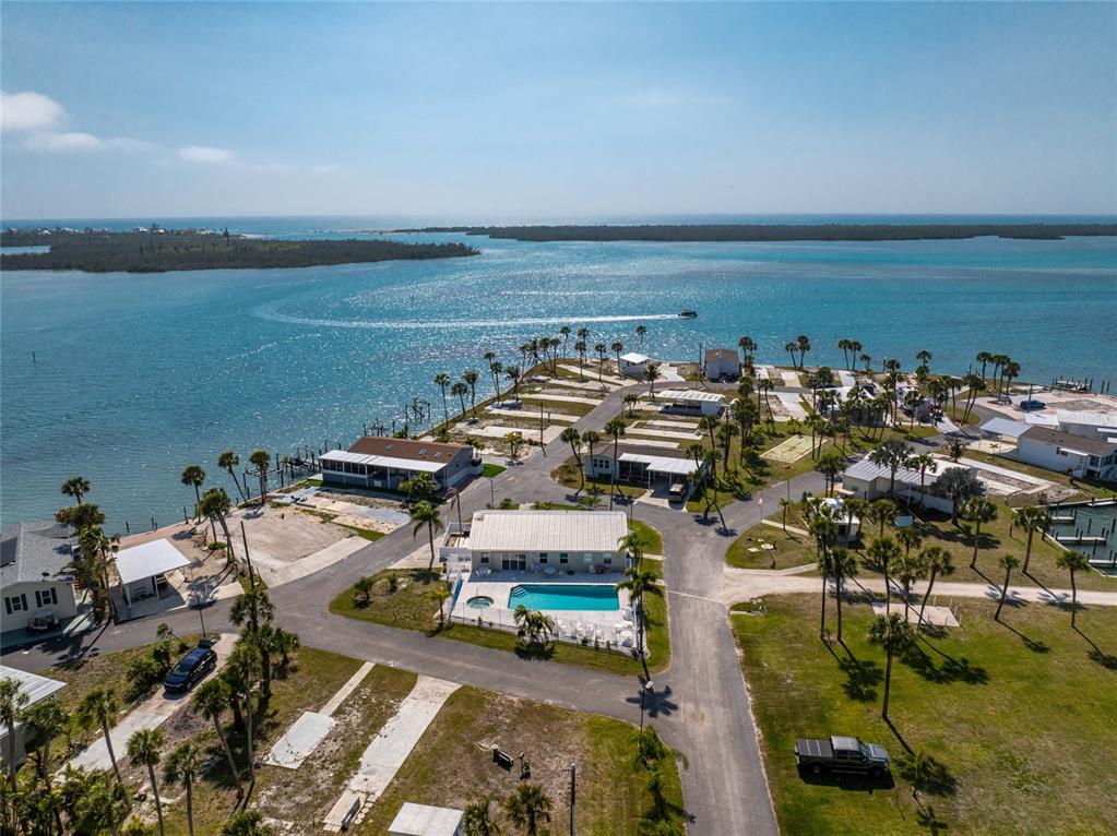 7500 Park Pointe Drive, Unit 42 Englewood, FL 34224 - Photo 10 of 33 an aerial view of a city with ocean view