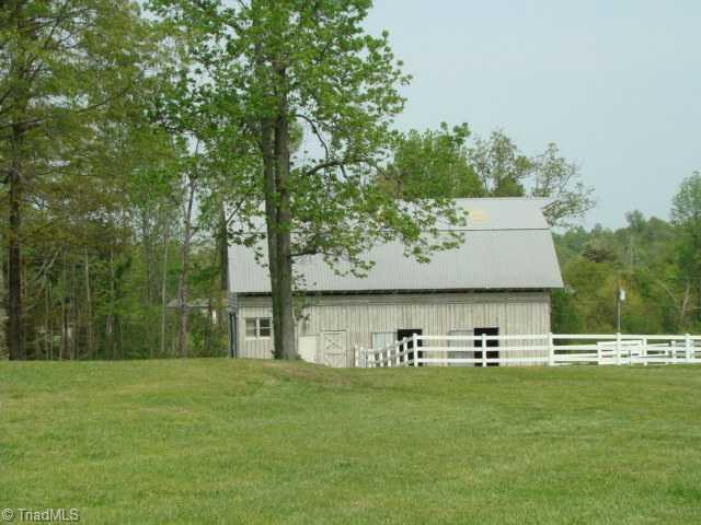 3382 Greeson Country Road Climax, NC 27233 - Photo 13 of 16 Stable/Barn. 36 x 48 barn with seven 12 x 12 stalls