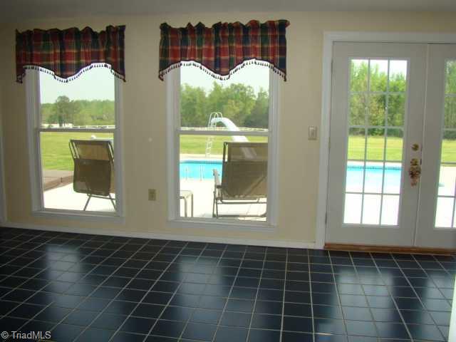 3382 Greeson Country Road Climax, NC 27233 - Photo 6 of 16 Sunroom.