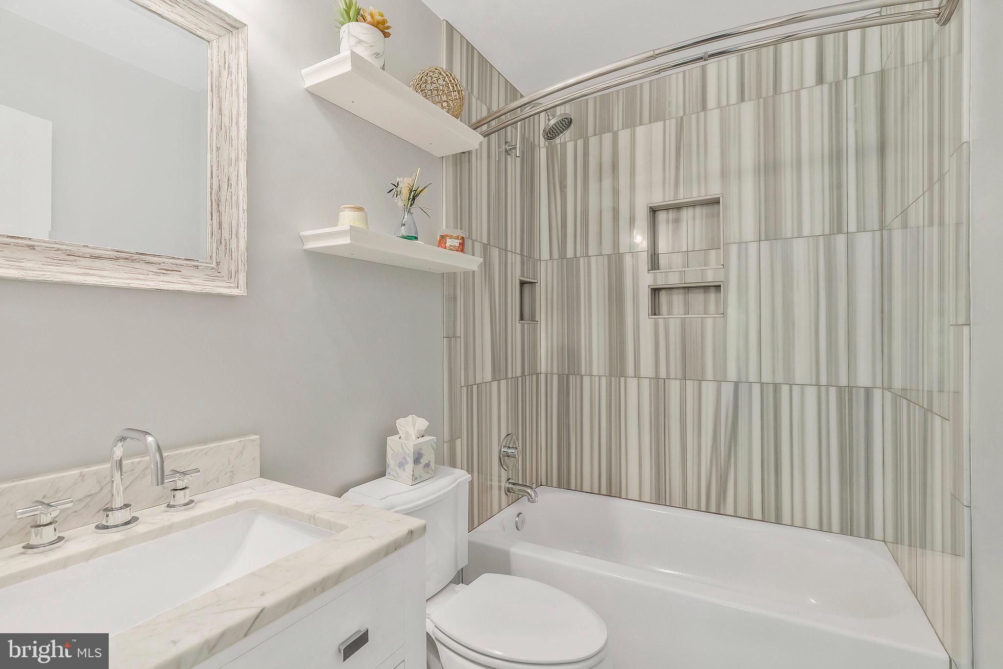 2026 Chadds Ford Drive Reston, VA 20191 - Photo 24 of 45 Primary bath is updated with modern finishes