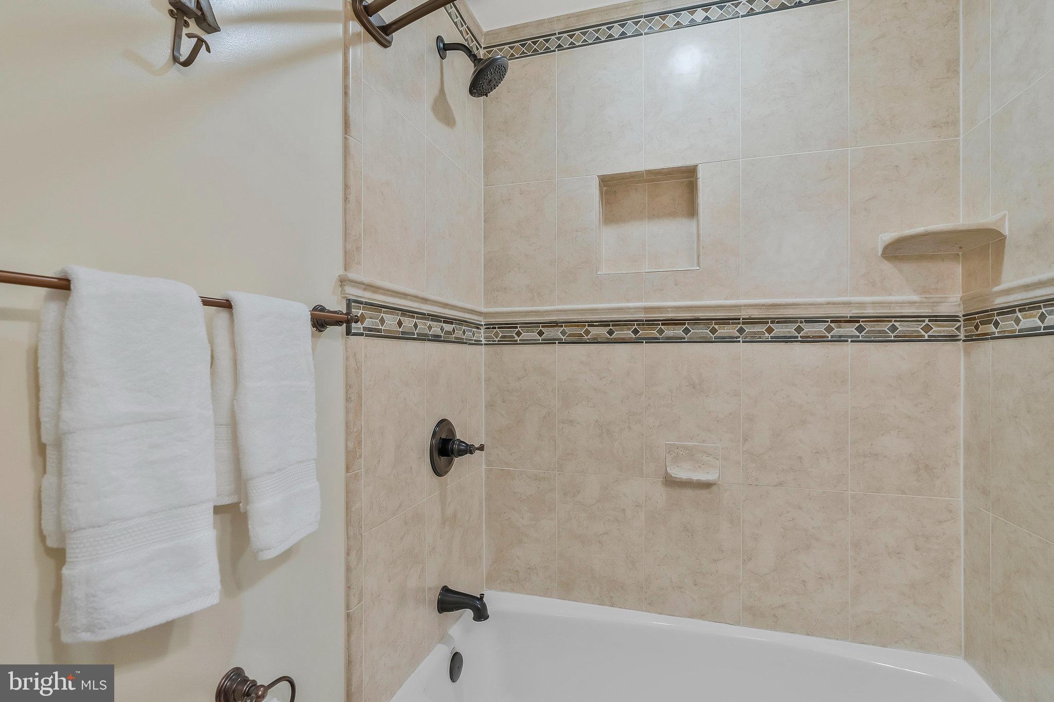 2026 Chadds Ford Drive Reston, VA 20191 - Photo 30 of 45 Second and third bedrooms share a full hall bath