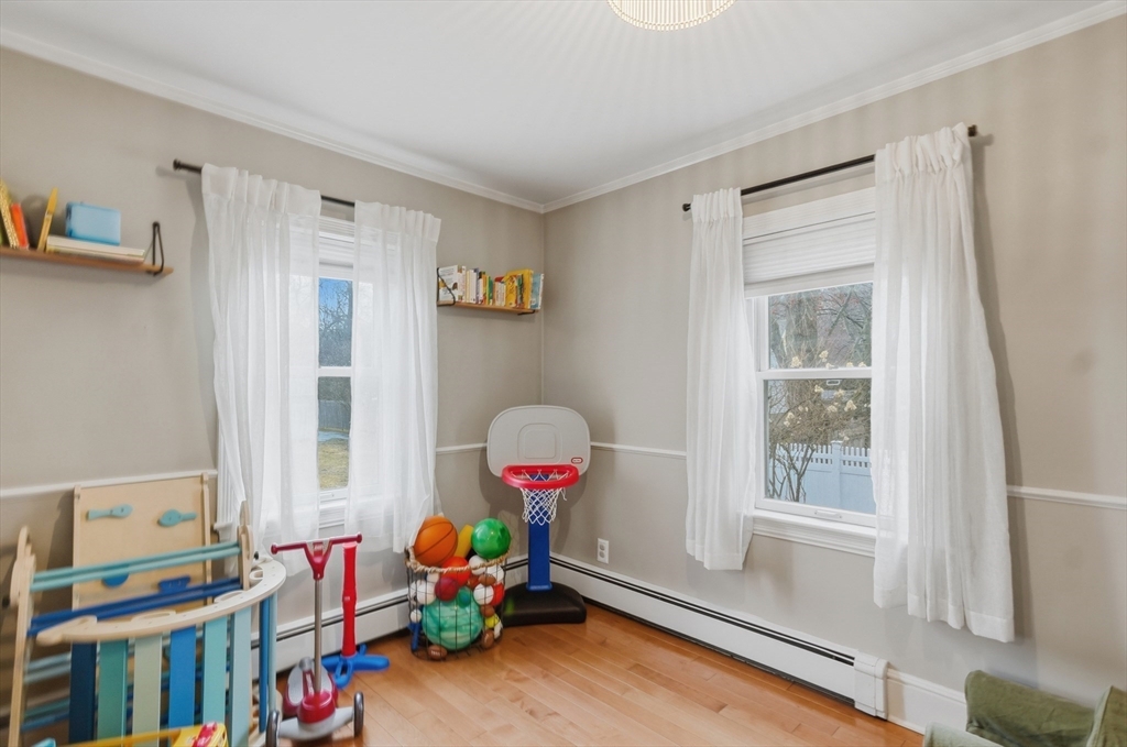 24 Minot Street Reading, MA 01867 - Photo 25 of 34 a living room with furniture and a window