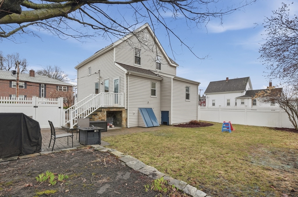 24 Minot Street Reading, MA 01867 - Photo 31 of 34 a view of a house with roof deck