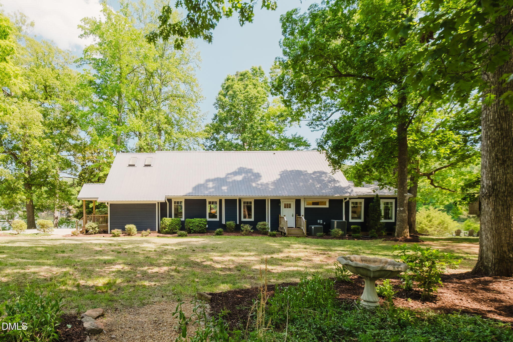 370 Robinson Ferry Road Macon, NC 27551 - Photo 72 of 85 a front view of a house with a yard