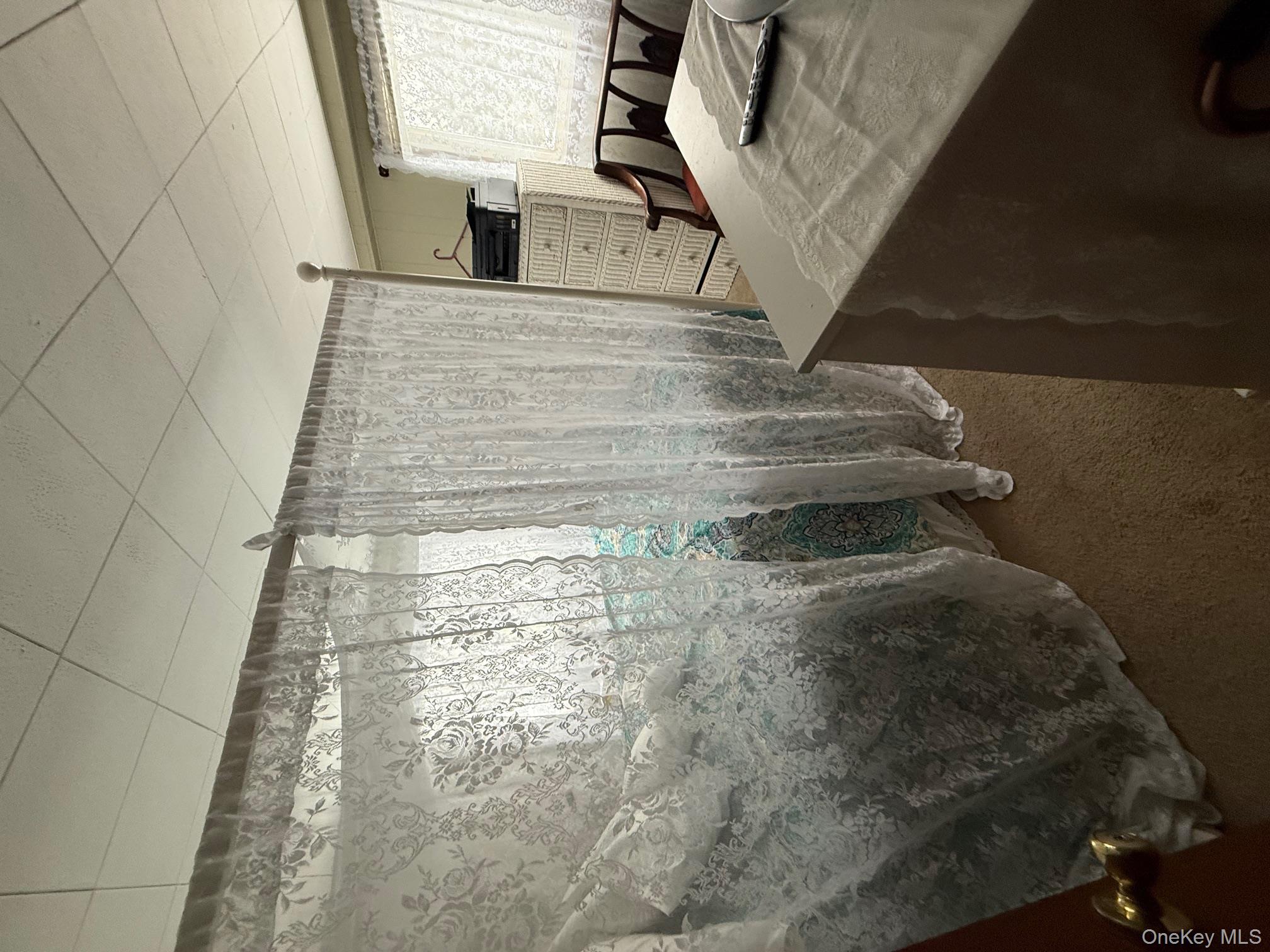 8 Beech Place Lake Peekskill, NY 10537 - Photo 19 of 19 a bathroom with a sink and a shower