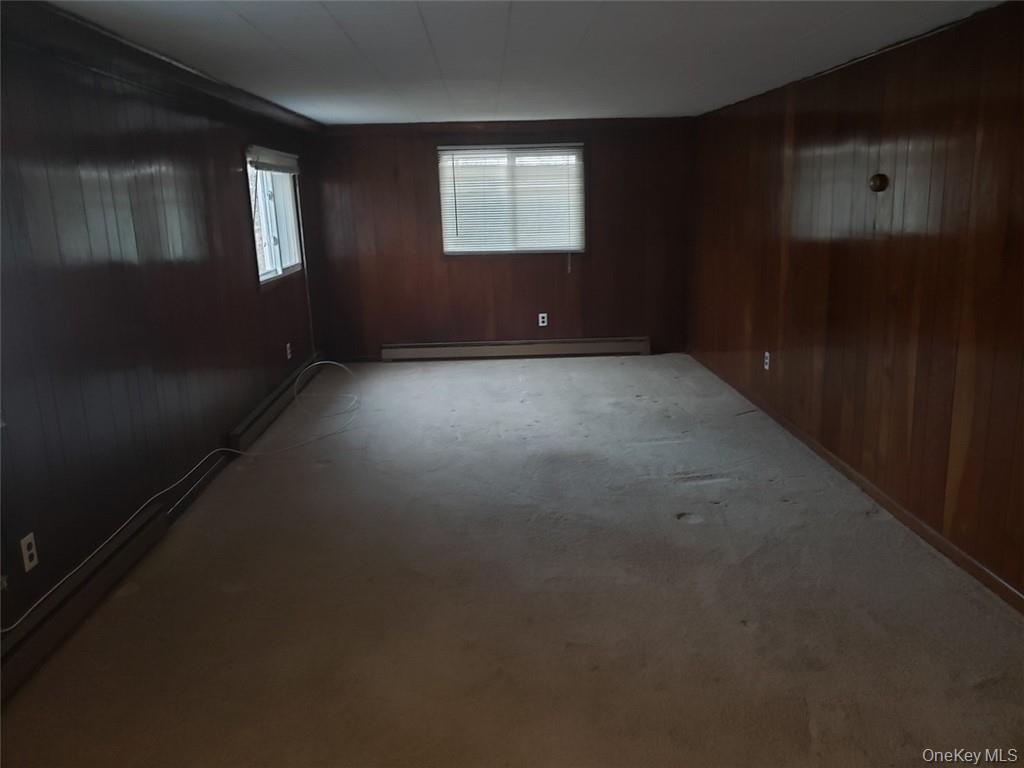 8 Beech Place Lake Peekskill, NY 10537 - Photo 7 of 19 an empty room with windows