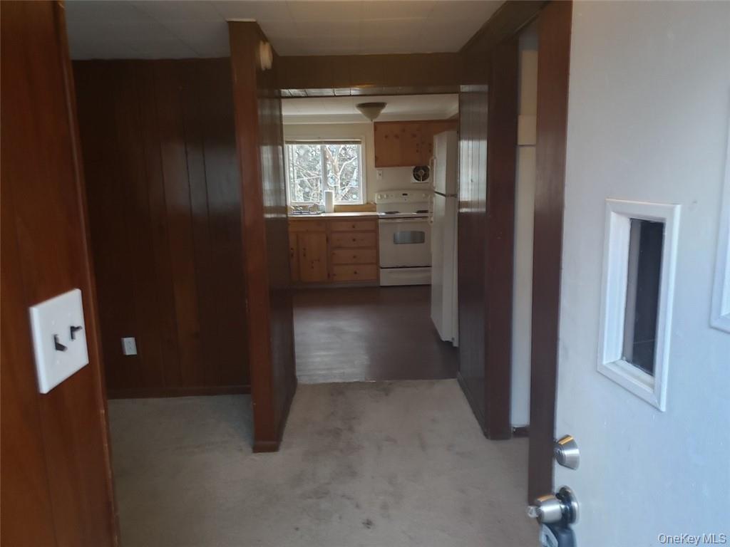 8 Beech Place Lake Peekskill, NY 10537 - Photo 10 of 19 a view of hallway with bathroom and a window