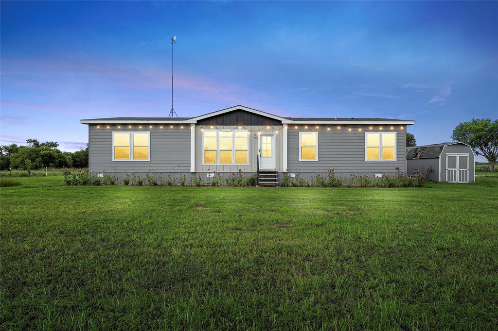 152 County Road 152 Riesel, TX 76682 - Photo 1 of 27 a front view of a house with a yard
