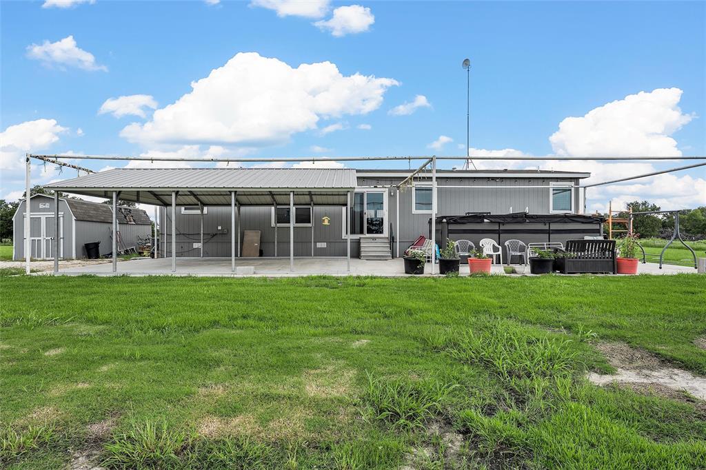 152 County Road 152 Riesel, TX 76682 - Photo 18 of 27 a view of a house with backyard and porch