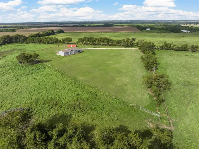 a view of a lake with a houses