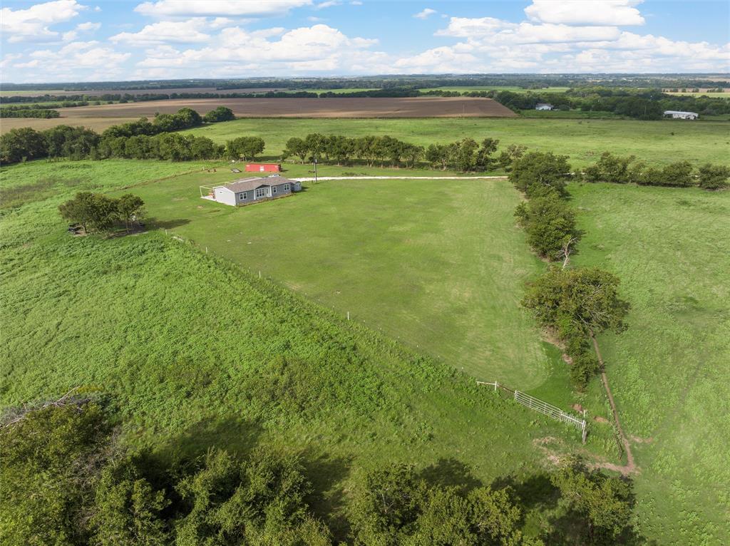 152 County Road 152 Riesel, TX 76682 - Photo 22 of 27 a view of a lake with a houses