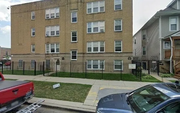 a view of a yard in front of a building