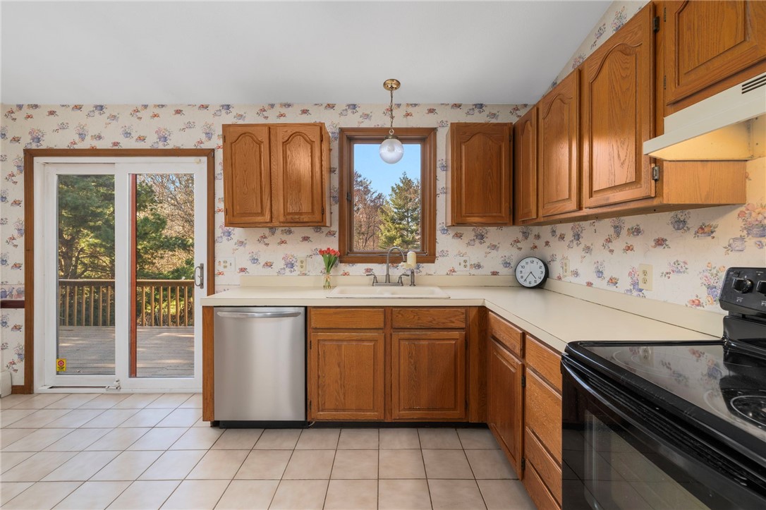 285 Randall Avenue Warwick, RI 02889 - Photo 8 of 37 Spacious kitchen w/view of deck & inground pool abutting Harbor Lights!
