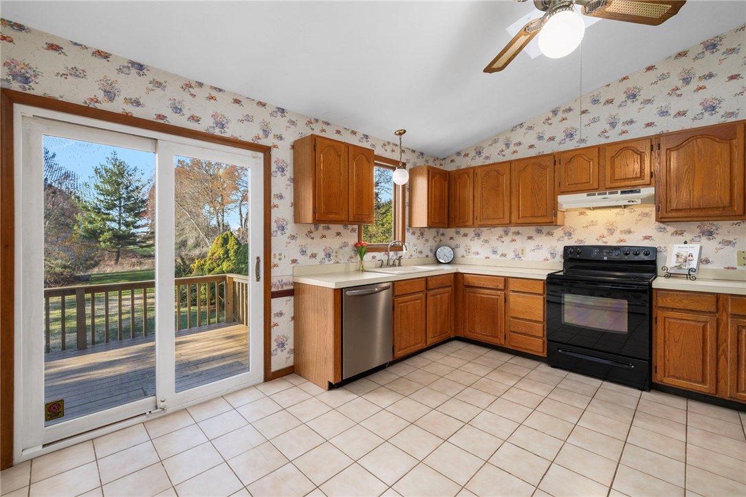 285 Randall Avenue Warwick, RI 02889 - Photo 9 of 37 Spacious kitchen w/view of deck & inground pool abutting Harbor Lights!