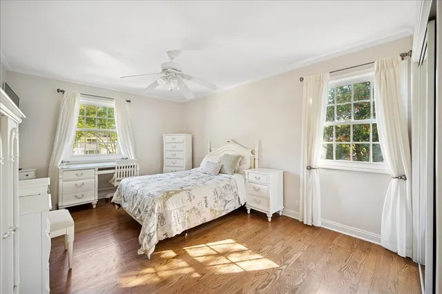 a bed room with a bed and a window