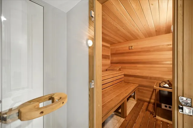 a view of a balcony with wooden floor