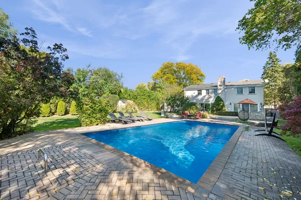 a view of a swimming pool and outdoor space