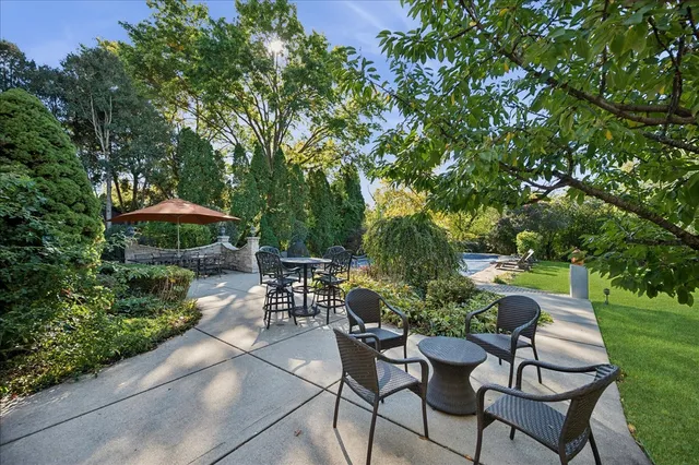 a view of yard with seating area and green space