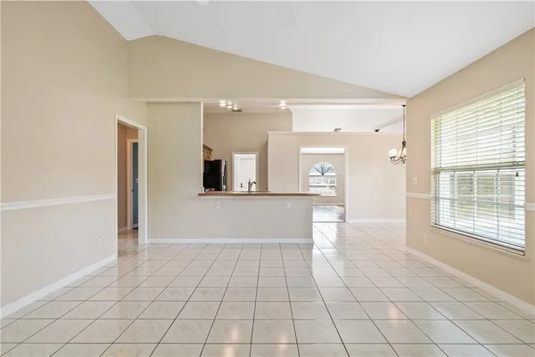 a view of an empty room and window
