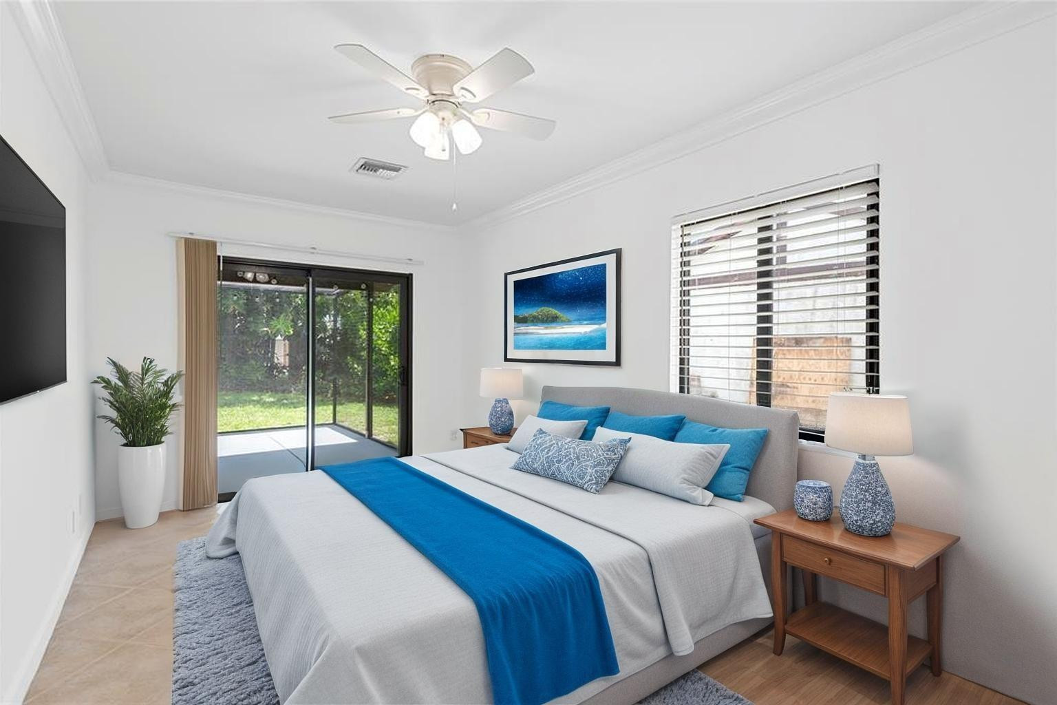 22840 Markham Way Boca Raton, FL 33428 - Photo 16 of 30 a bedroom with a large bed and a large window