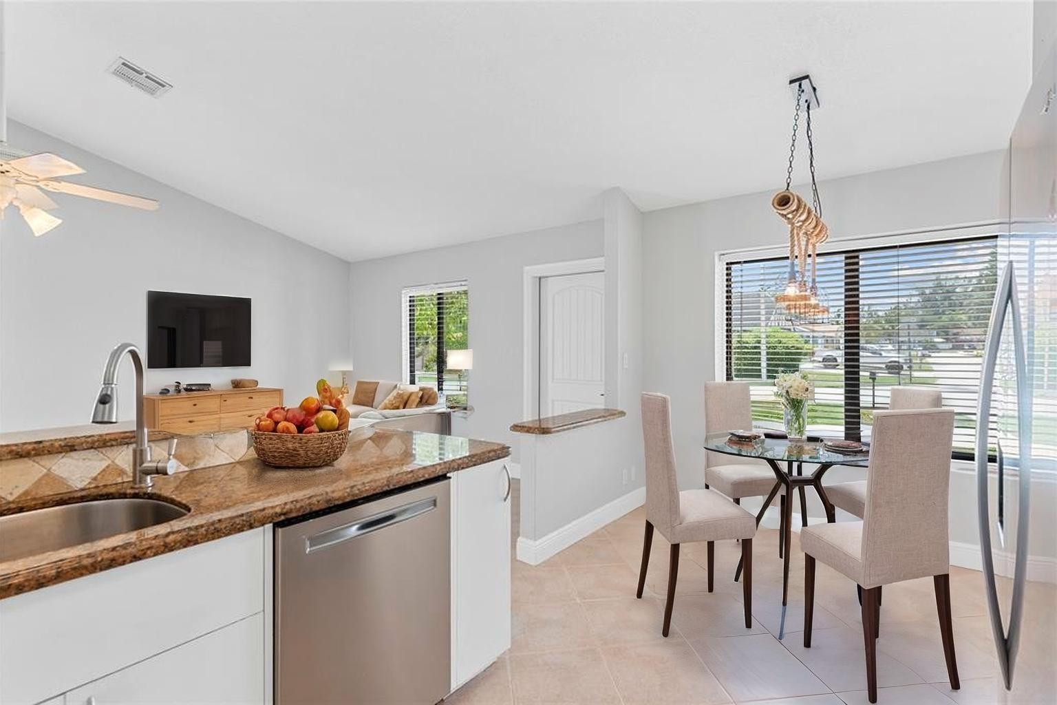 22840 Markham Way Boca Raton, FL 33428 - Photo 18 of 30 a kitchen with sink and view of living room