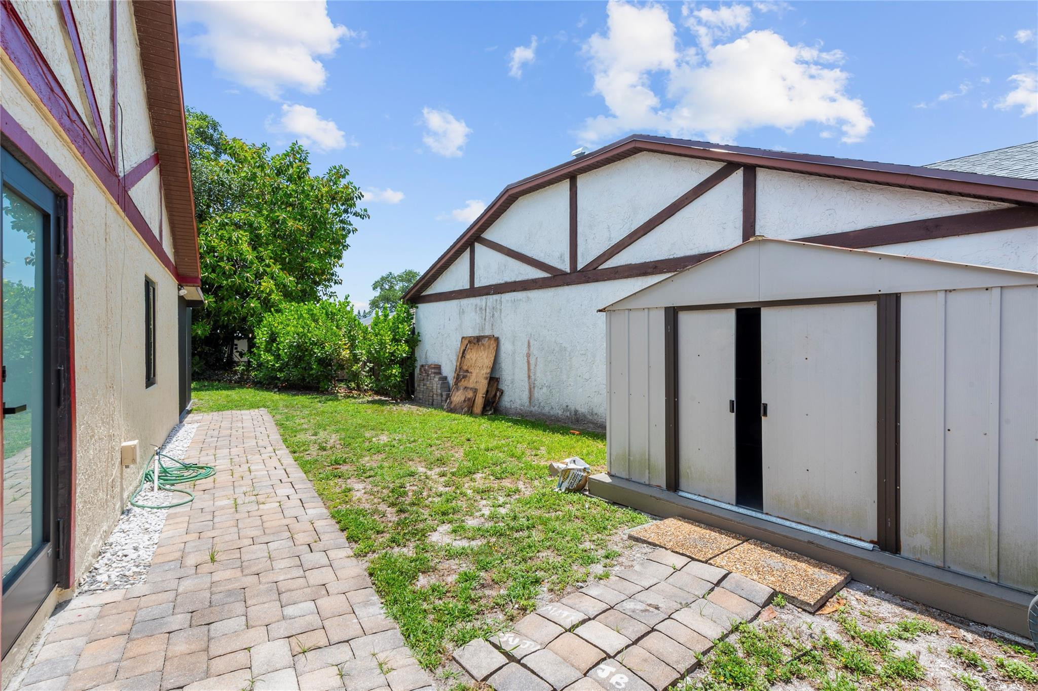 22840 Markham Way Boca Raton, FL 33428 - Photo 25 of 30 a front view of a house with garden