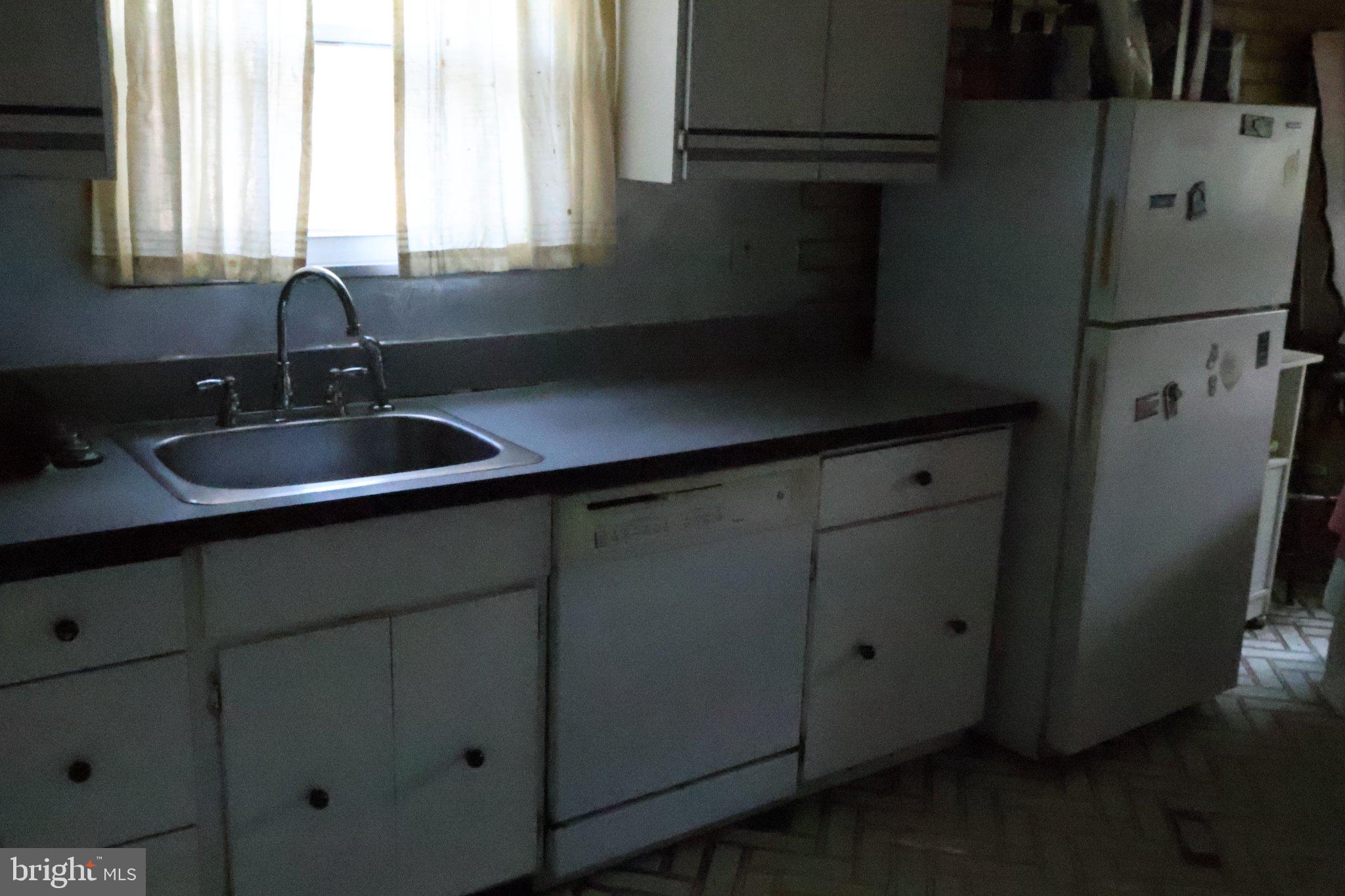1456 Thornberry Road Wyncote, PA 19095 - Photo 11 of 25 Charming vintage kitchen awaits revival.