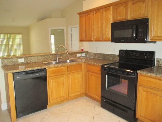 7955 Terrace Road Hypoluxo, FL 33462 - Photo 7 of 14 Kitchen