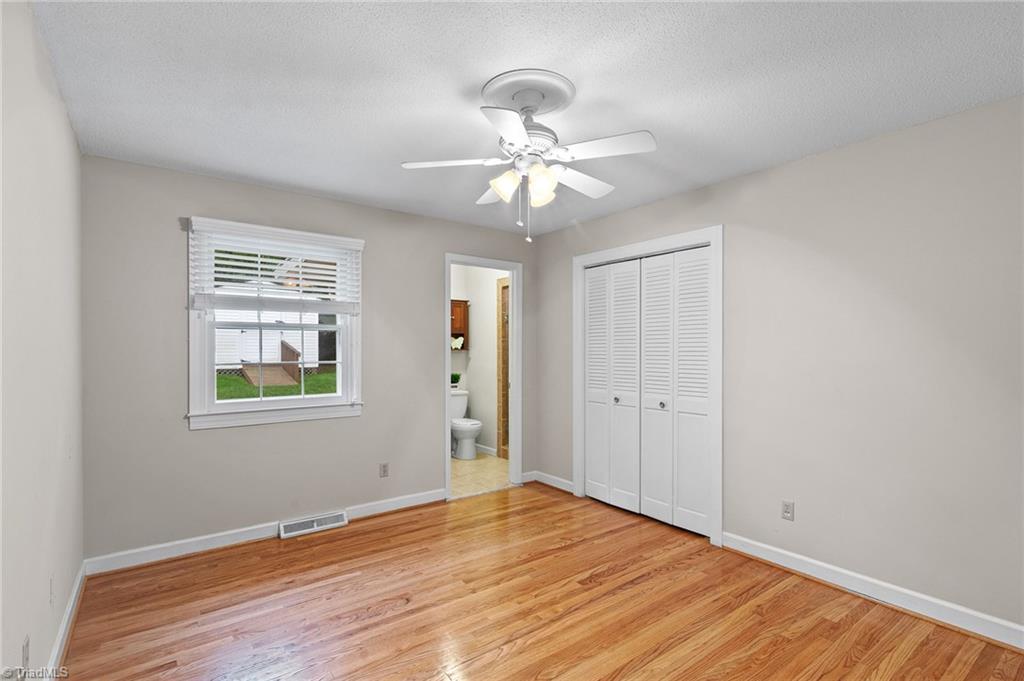1610 Bolingbroke Road High Point, NC 27265 - Photo 13 of 24 SECOND MASTER! This bedroom also has a full bath with a new tiled walk in shower!